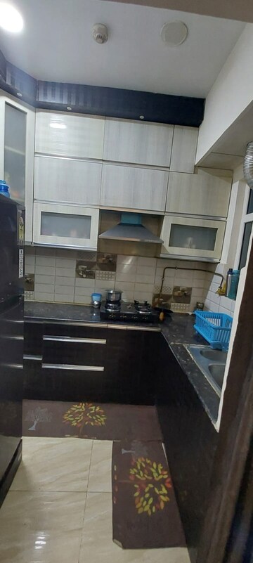 Kitchen in 2 BHK Apartment at Gaur City 2 - 14th Avenue, Sector 16c Greater Noida – for Rent