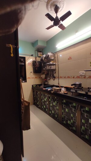 Kitchen in 1 BHK Apartment at Bindra Complex, Andheri East – for Sale