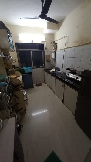Kitchen in 3 BHK Apartment at Proviso Tower CHS, Kopar Khairane – for Sale