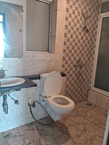 Bathroom in 2.5 BHK Apartment at Mahagun Mirabella, Sector 79 – for Rent