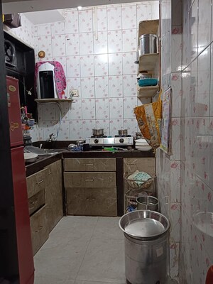 Kitchen in 1 BHK Apartment at Kopar Khairane Sector 19 – for Sale