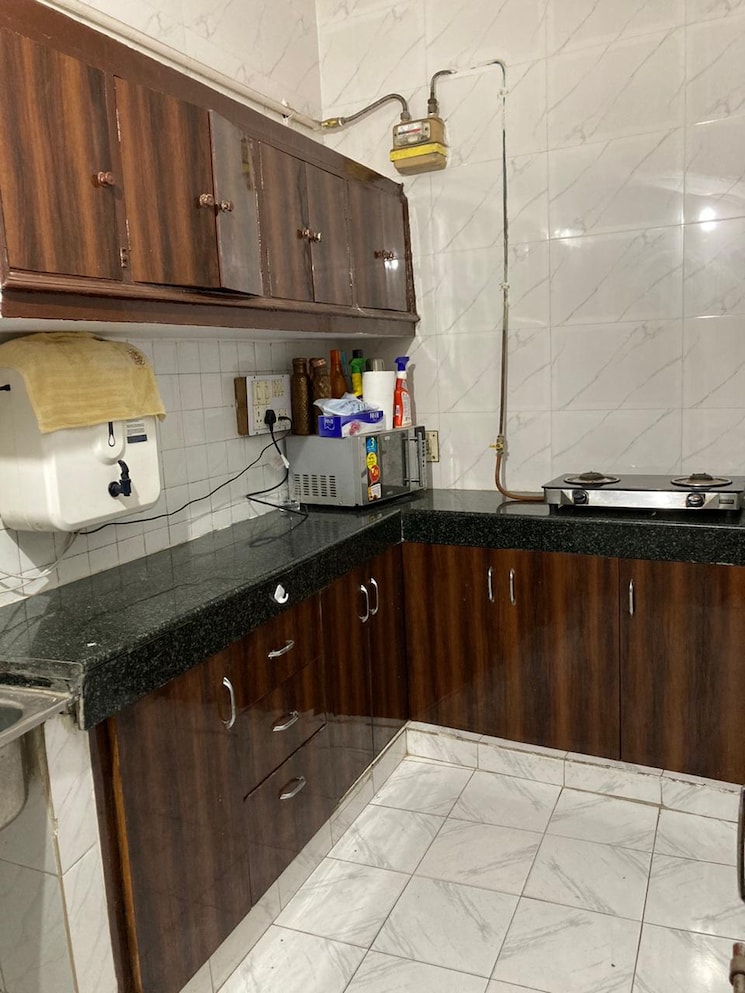 Kitchen, lajpat nagar iii 3 Bedroom 200 Sq.Yd. Builder Floor In Lajpat Nagar Iii Delhi 9143557