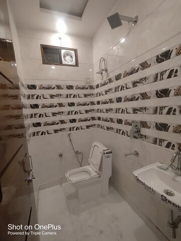 Bathroom in 3 BHK Builder Floor at Dwarka Mor – for Rent