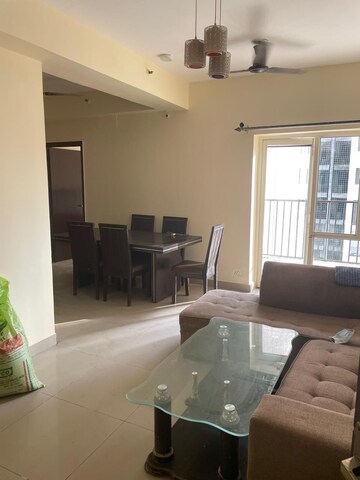 Living Room in 2 BHK Apartment at Amrapali Golf Homes, Sector 4 Greater Noida – for Rent