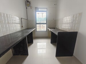 Kitchen in 1 BHK Apartment at Kalpataru Immensa, Kolshet Road – for Sale