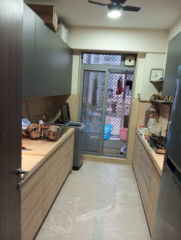Kitchen in 3 BHK Apartment at Piramal Vaikunth, Balkum Pada – for Rent