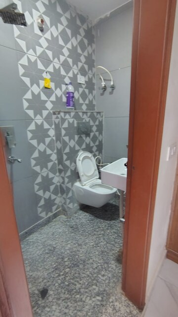 Bathroom in 3 BHK Builder Floor at Dwarka Mor – for Rent