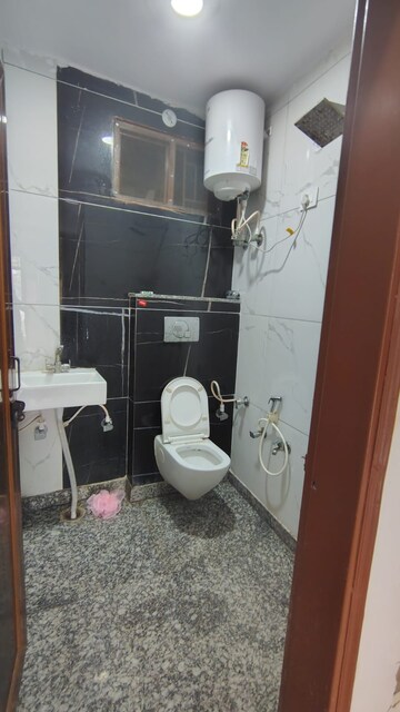 Bathroom in 3 BHK Builder Floor at Dwarka Mor – for Rent