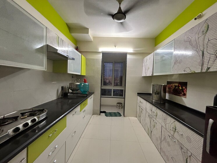 Kitchen, puranik-rumah-bali 3 Bedroom 800 Sq.Ft. Apartment In Ghodbunder Road Thane 9144151