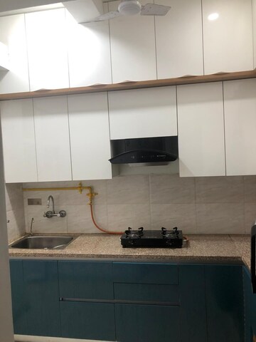 Kitchen in 2 BHK Apartment at Ajnara Grand Heritage, Sector 74 – for Rent