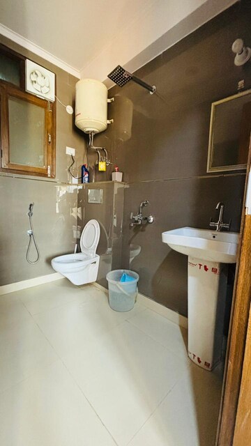 Bathroom in 2 BHK Apartment at Chattarpur – for Rent