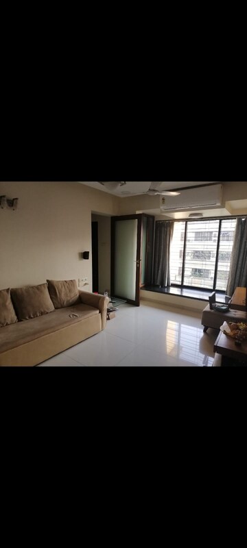 Living Room in 2 BHK Apartment at Vile Parle West – for Rent