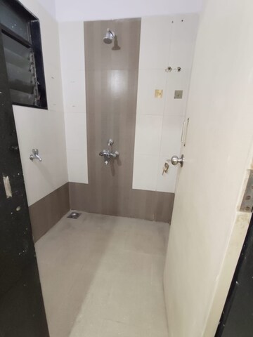 Bathroom in 1 BHK Apartment at Nisarg Hyde Park, Kharghar – for Rent