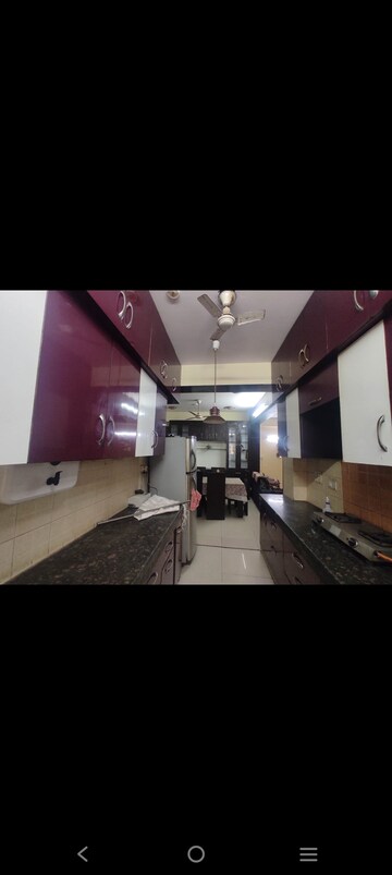Kitchen in 2 BHK Apartment at Supertech Livingston, Sain Vihar – for Rent