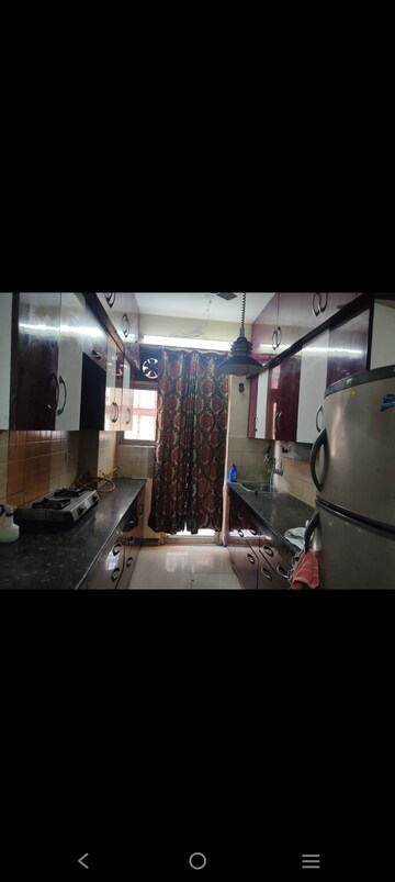 Living Room in 2 BHK Apartment at Supertech Livingston, Sain Vihar – for Rent