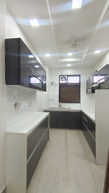 Kitchen in 4 BHK Builder Floor at Palm Residency Chhatarpur, Chattarpur – for Rent