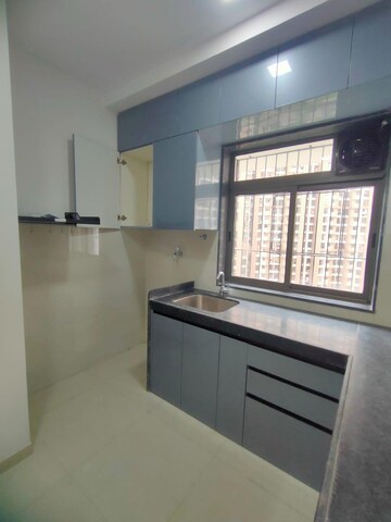 Kitchen in 2 BHK Apartment at Runwal Eirene, Balkum Pada – for Rent