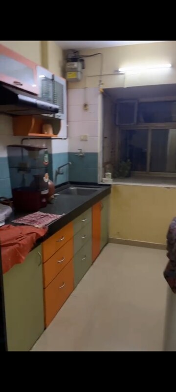 Kitchen in 1 BHK Apartment at Neelkanth Greens, Manpada – for Rent