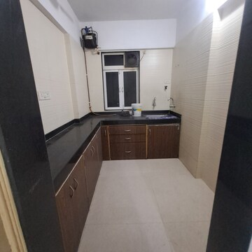 Kitchen in 1 BHK Apartment at Cosmos Classique, Ghodbunder Road – for Sale