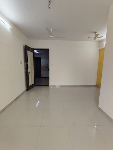 Living Room in 2 BHK Apartment at Hyde Park CHS, Kharghar – for Rent