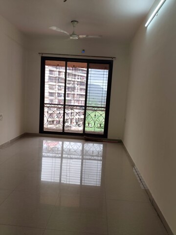Living Room in 2 BHK Apartment at Hyde Park CHS, Kharghar – for Rent