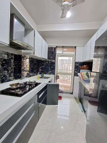 Kitchen in 2 BHK Apartment at Shree Ramdev Ritu Heights, Mira Road – for Rent