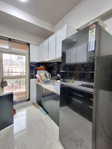 Kitchen in 2 BHK Apartment at Shree Ramdev Ritu Heights, Mira Road – for Rent