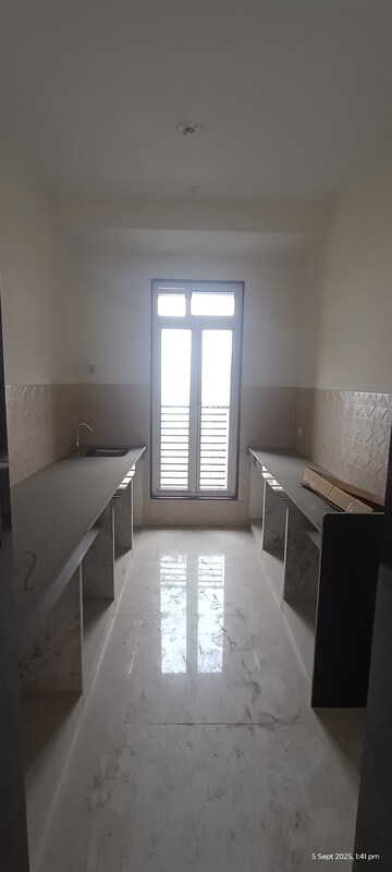 Kitchen in 3 BHK Apartment at Sheth Vasant Lawns, Laxmi Nagar – for Sale