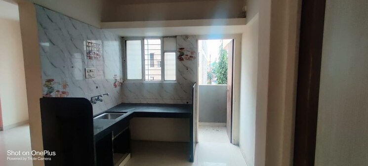 Kitchen, shiv-divine-desire 2 Bedroom 828 Sq.Ft. Apartment In Rahatani Pune 9144916