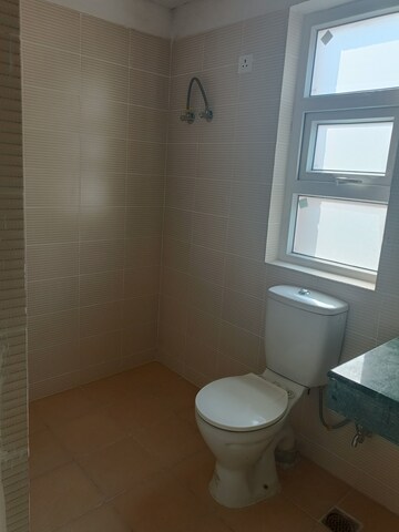 Bathroom in 3.5 BHK Builder Floor at BPTP Park 81, Sector 81 – for Sale
