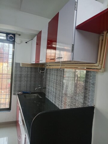 Kitchen in 1 BHK Apartment at Parel Lokseva CHS, Worli – for Rent
