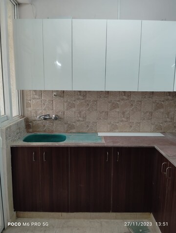 Kitchen in 3 BHK Apartment at Amrapali Golf Homes, Sector 4 Greater Noida – for Rent