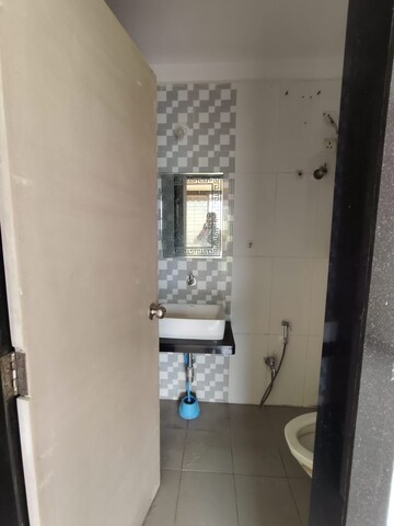 Bathroom in 3 BHK Apartment at Nisarg Hyde Park, Kharghar – for Rent