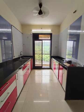Kitchen in 3 BHK Apartment at Nisarg Hyde Park, Kharghar – for Rent