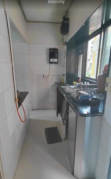 Kitchen in 2 BHK Apartment at Hill Garden, Manpada – for Sale