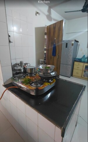 Kitchen in 2 BHK Apartment at Hill Garden, Manpada – for Sale