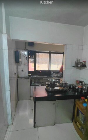 Kitchen in 2 BHK Apartment at Hill Garden, Manpada – for Sale