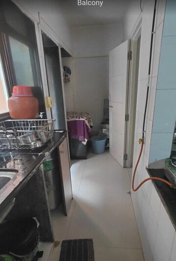 Kitchen in 2 BHK Apartment at Hill Garden, Manpada – for Sale