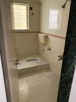 Bathroom in 3 BHK Apartment at Ganesham Phase I, Pimple Saudagar – for Sale