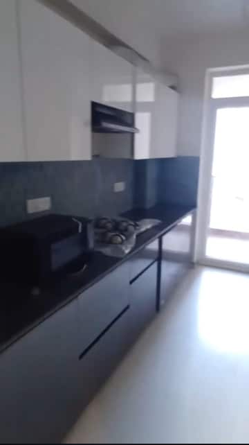 Kitchen in 3 BHK Apartment at Cosmos Express 99, Sector 99 – for Sale