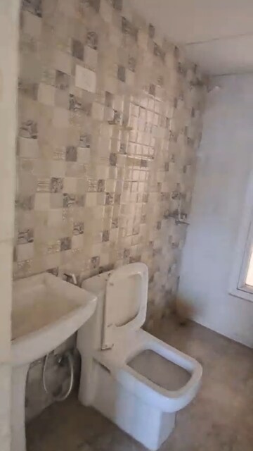 Bathroom in 2 BHK Apartment at Nilaya Greens, Raj Nagar Extension – for Sale