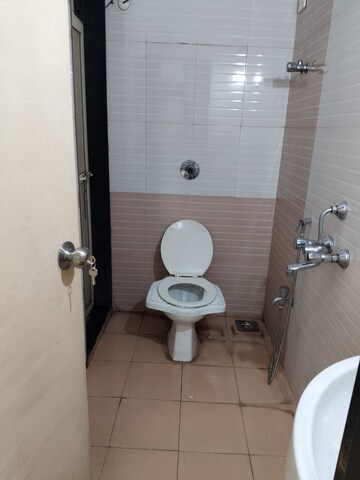 Bathroom in 3 BHK Apartment at Nisarg Hyde Park, Kharghar – for Rent