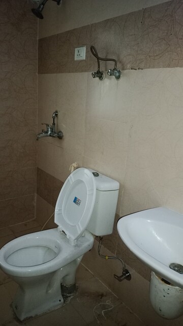 Bathroom in 3 BHK Apartment at Antriksh Golf View, Sector 78 – for Rent