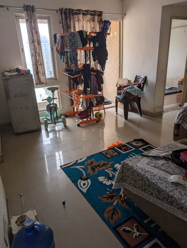 Living Room, jaypee-greens-kosmos 2 Bedroom 942 Sq.Ft. Apartment In Sector 134 Noida 9145533