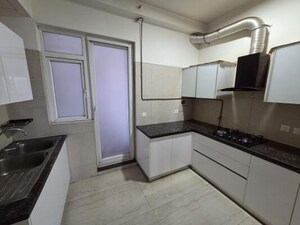 Kitchen in 3.5 BHK Apartment at Microtek Greenburg, Sector 86 – for Sale