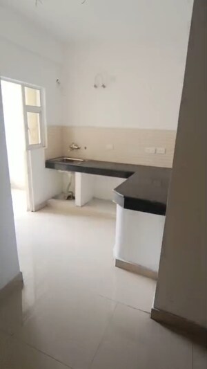 Kitchen in 2 BHK Apartment at VVIP Addresses, Raj Nagar Extension – for Sale
