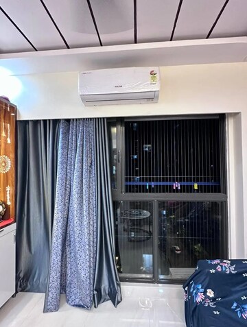 Living Room in 1 BHK Apartment at Lodha Crown Quality Homes, Majiwada – for Rent