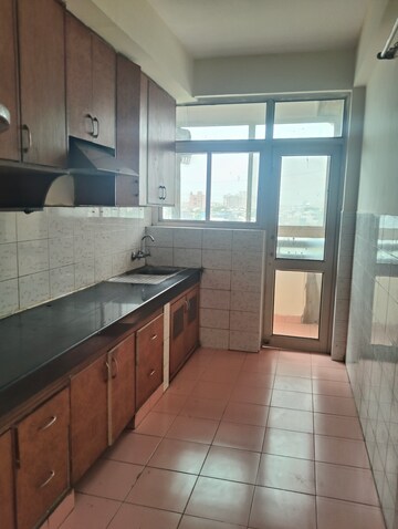 Kitchen in 1 BHK Apartment at Ansal Sushant Estate, Sector 52 – for Sale
