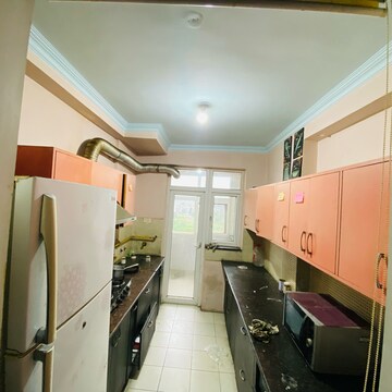 Kitchen in 3 BHK Apartment at Gardenia Golf City, Noida Central – for Rent