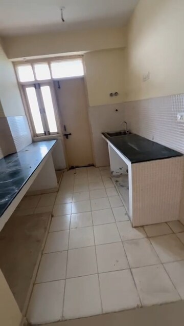 Kitchen in 2 BHK Apartment at RAS Palm Residency, Sector 76 – for Rent